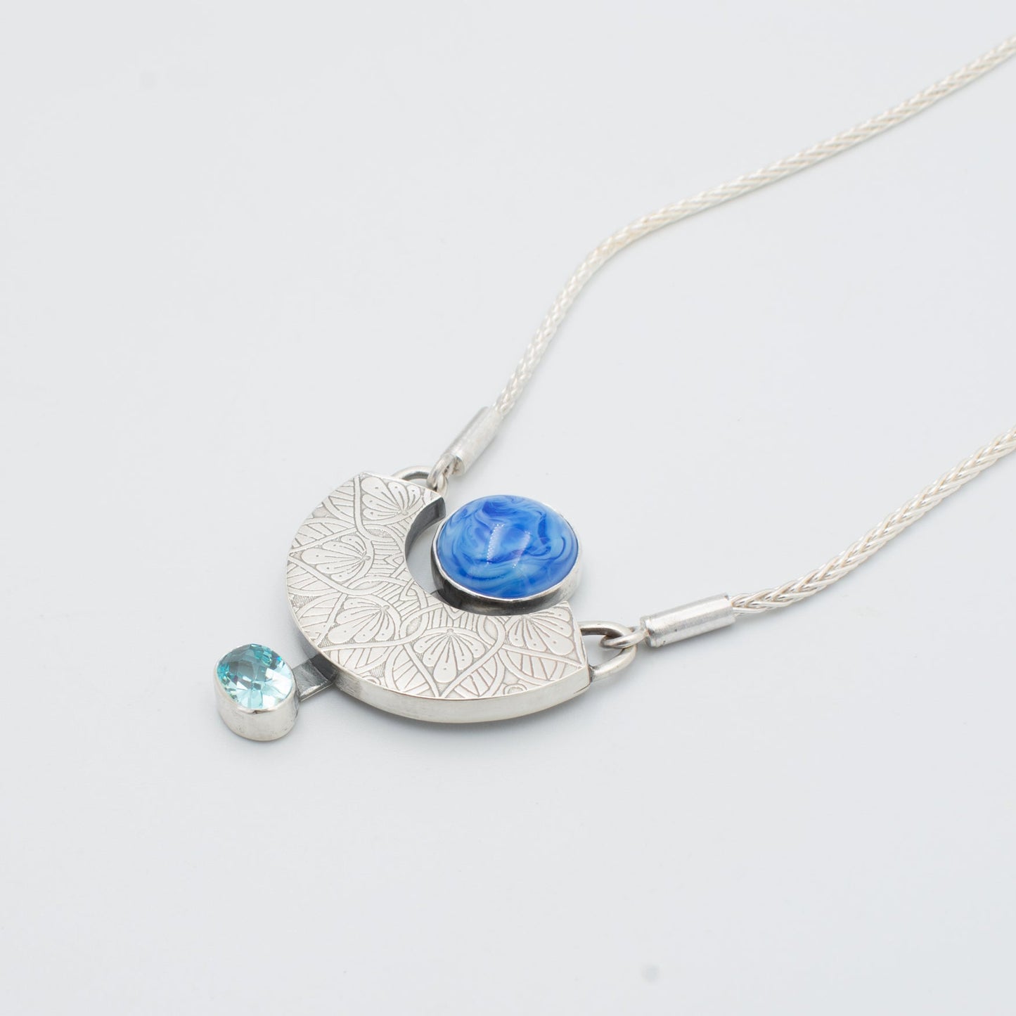 Blue Swirl and Topaz CZ Necklace