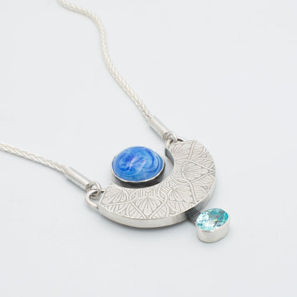 Blue Swirl and Topaz CZ Necklace