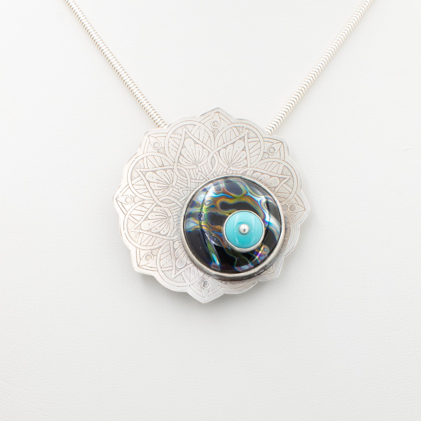 Modern Mandala Necklace in Turquoise, Black, and Silvered glass