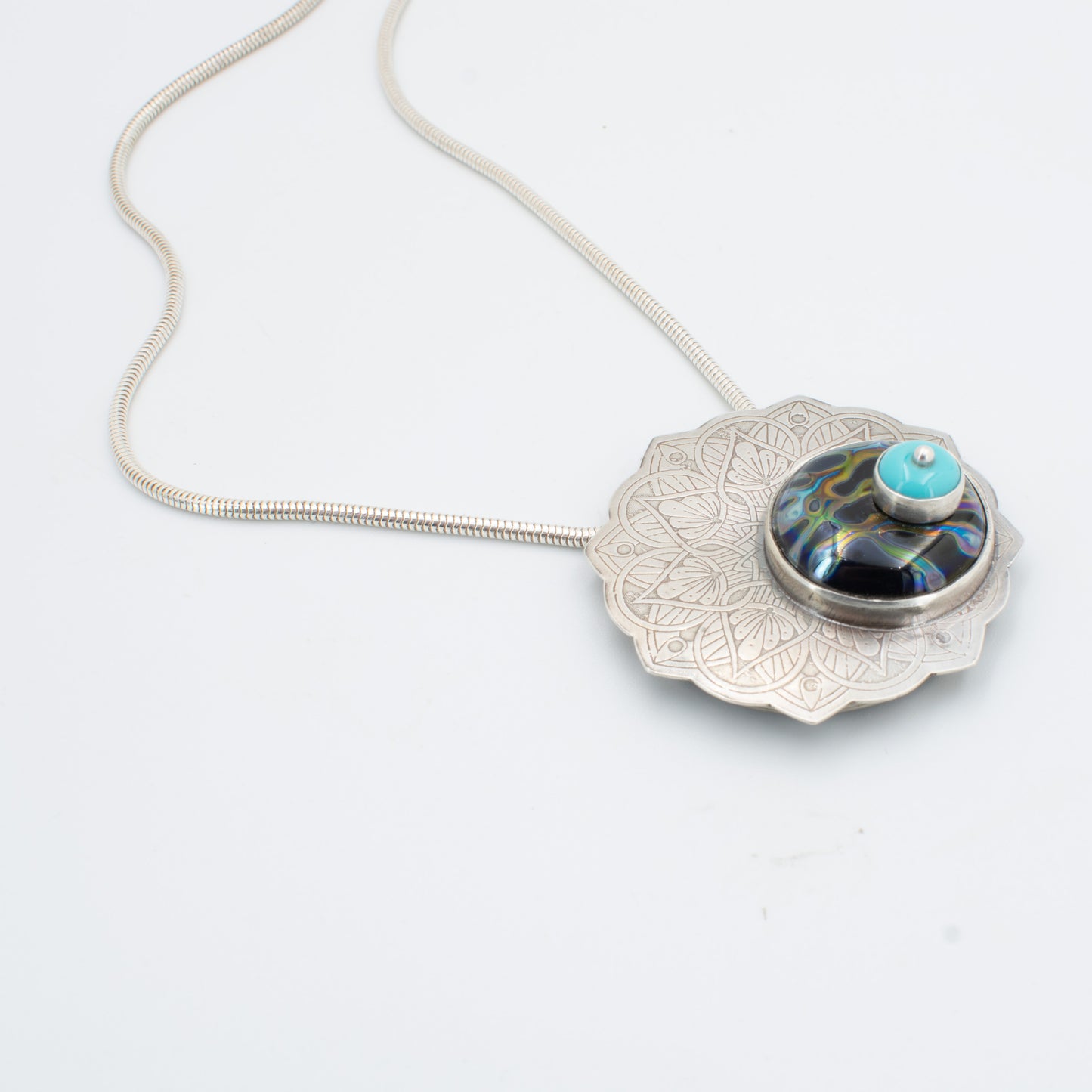 Modern Mandala Necklace in Turquoise, Black, and Silvered glass