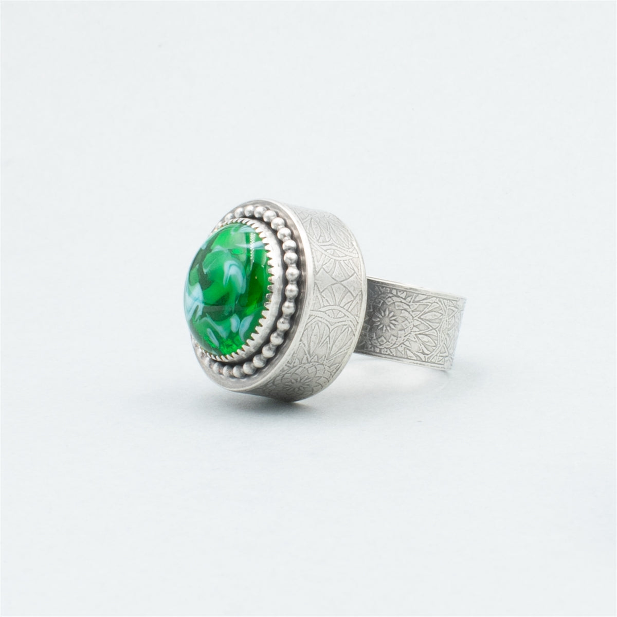 Emerald Swirl Statement Ring
